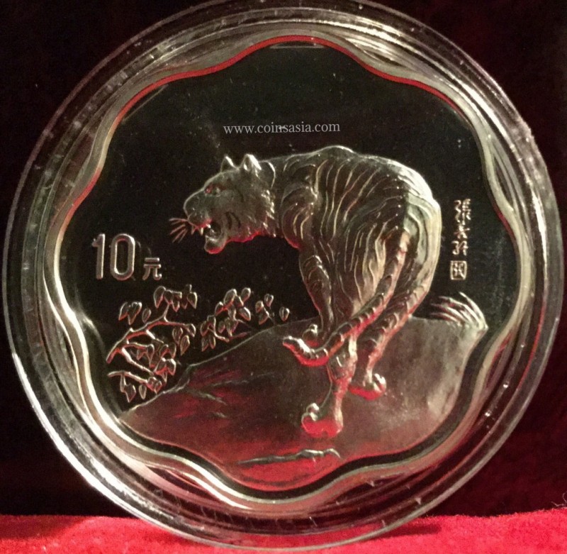 china plum blossom scallop silver coin